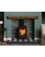A black wood burning stove and multi fuel stove, a rustic fireplace geocast beam, grey brick fireplace chamber, quarry hearth
