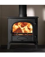 A black multi fuel stove, a wide front and narrow depth stove with single doors, ecodesign stove