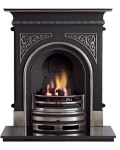 A black highlight polished cast iron fireplace with motif designs, a classic victorian period fireplace and a granite hearth.