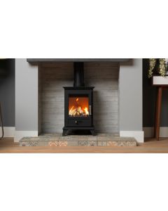 A black gas stove, a lpg gas stove, with a grey oak geocast beam, a grey fireplace chamber and a Tapestry tiled hearth