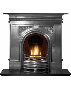 A fully polished cast iron fireplace with decorative motifs of Victorian style, stylish fire grate, with a granite hearth 